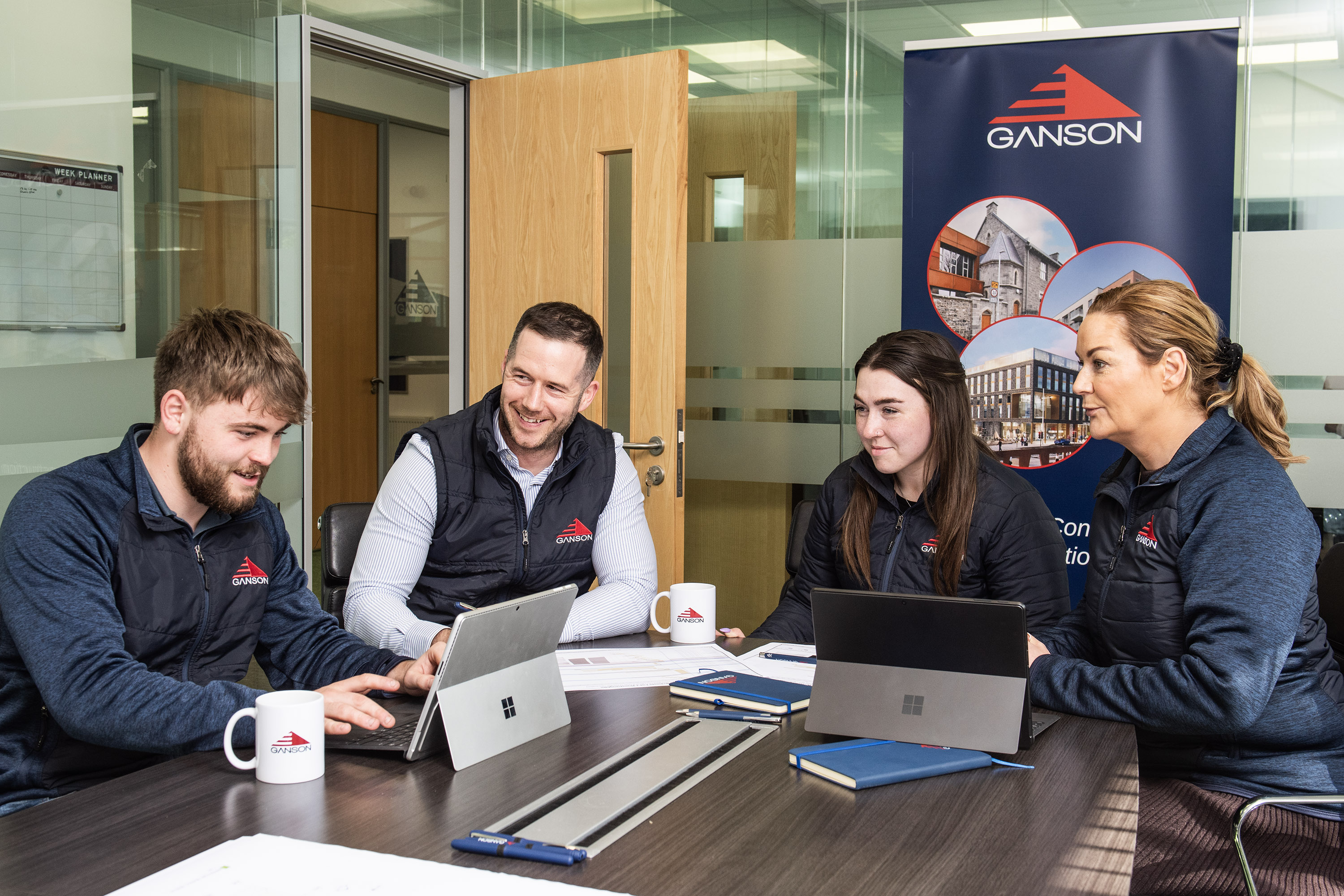 Ganson team collaborating in the office